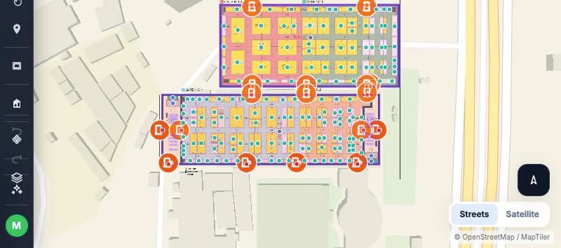 Mapnyx Studio editing an exhibition floor: booth polygons, hall zones, gate markers and the navigation graph drawn over the real site, with the drawing toolbar alongside.